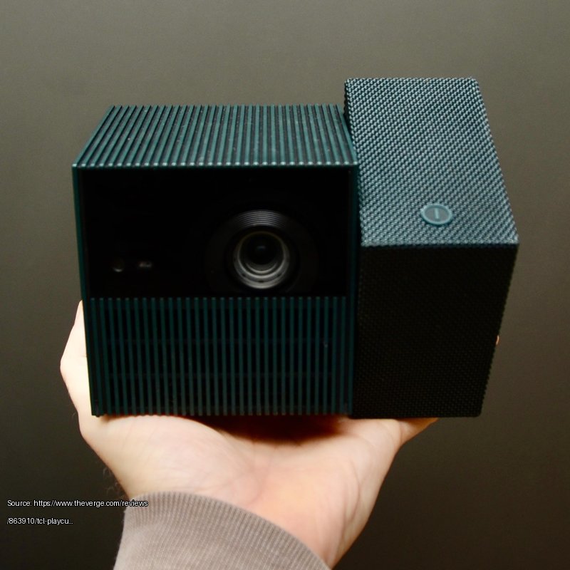 <em>Fits in the palm of your hand.</em> - Fair use review image from https://www.theverge.com/reviews/863910/tcl-playcube-portable-projector-review-battery
